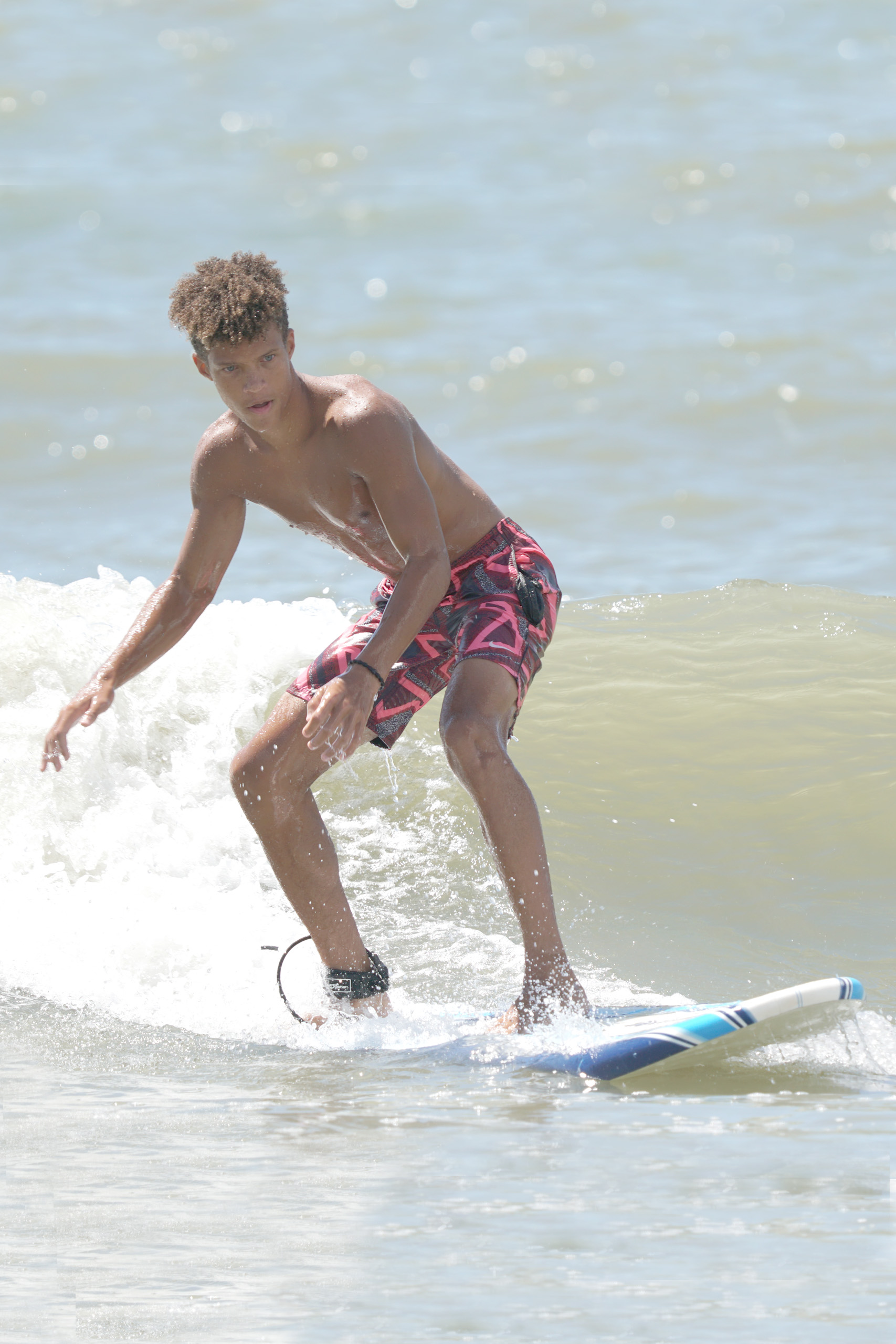 boy surfing in myrtle beach